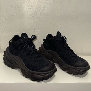 Nike Air Max Flyknit Venture women's shoe in a black colorway.